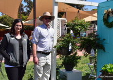 Layci Gragnani and Dan Schultz of Star Roses and Plants presenting Blueberry Midnight Cascade; a hanging basket blueberry.